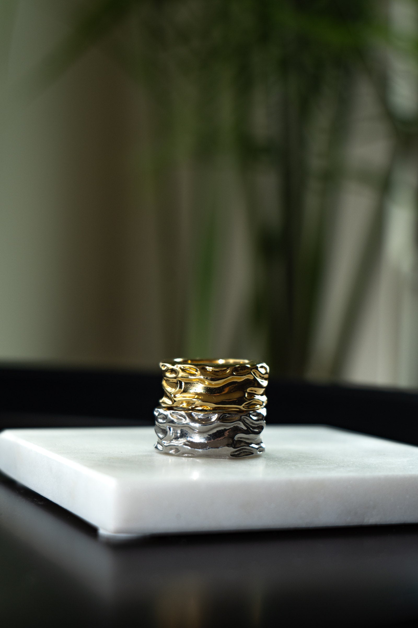 Aurean Flow Cloak shown in both silver and gold finishes